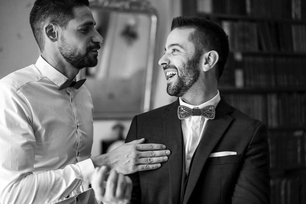 Providing Emotional Support to the Groom: The Best Man Talking to the Groom before the Wedding